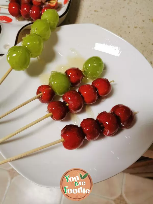 candied gourd on a stick