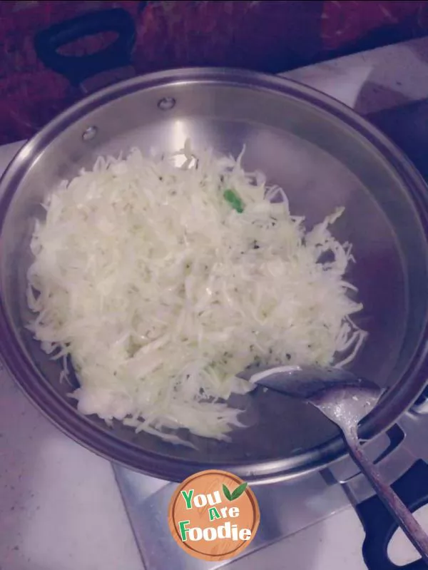 Fried cabbage with green pepper and agaric