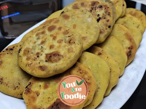 Three flavors of corn flour pancake (leek and egg, leek and pork, sesame brown sugar)