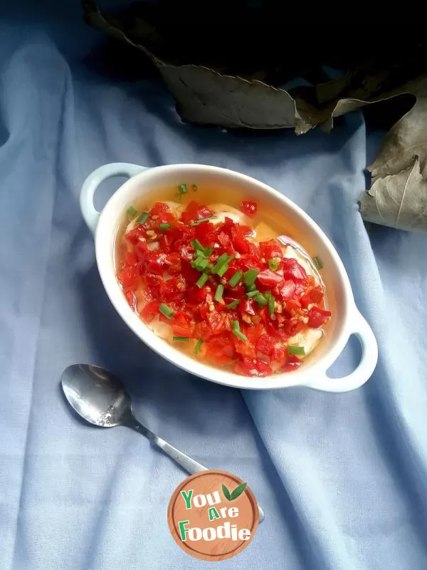 Steamed tofu with fish slices with chopped peppers