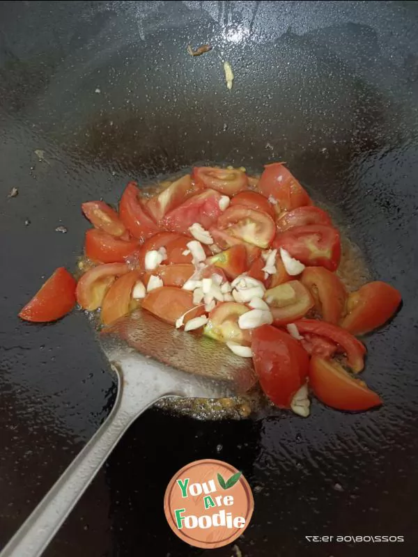 fried eggs with tomatoes