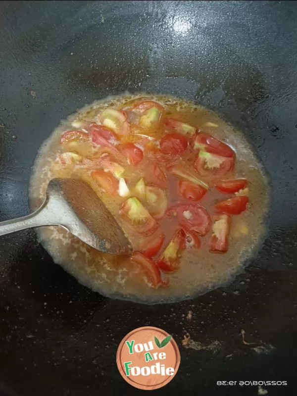 fried eggs with tomatoes