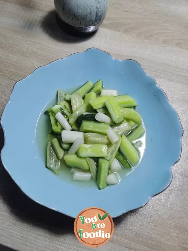 Stir fried cucumber with lotus root strips