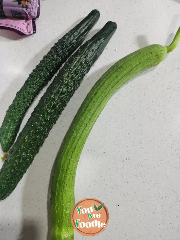 Stir fried cucumber with lotus root strips