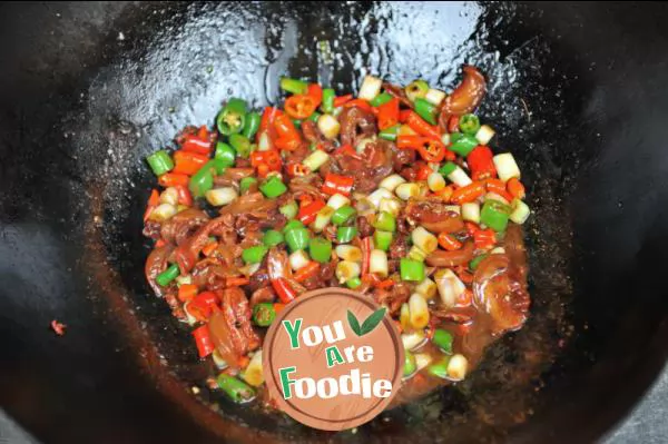 Fried meat with chili peppers