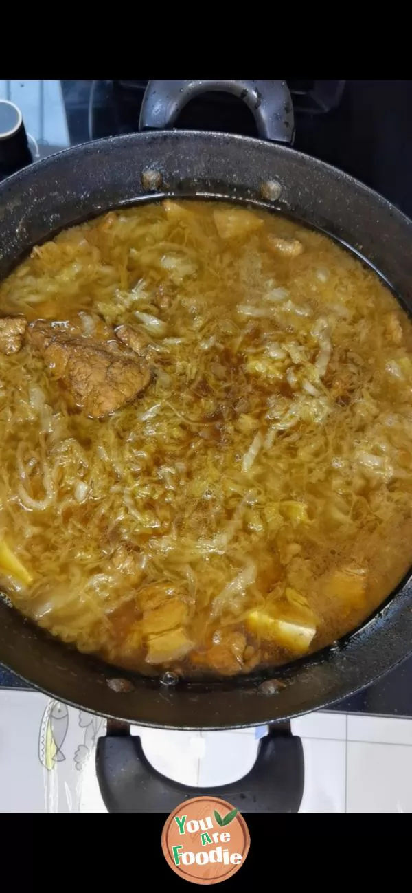 Stewed Pickled Cabbage with Pig Bone in Iron Pot