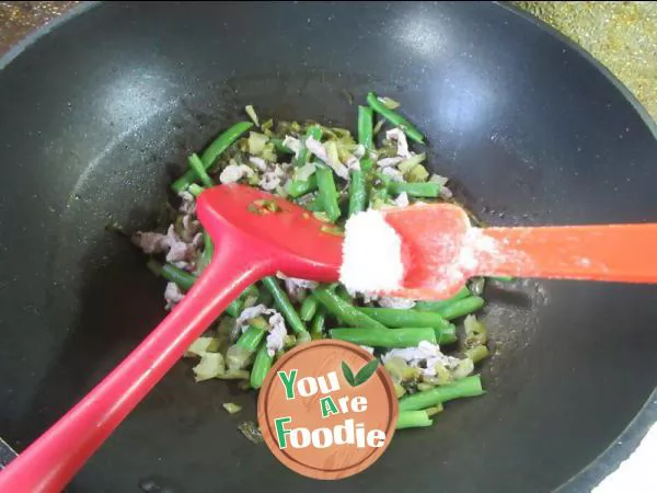 Sauteed green beans with shredded pork and pickled vegetables