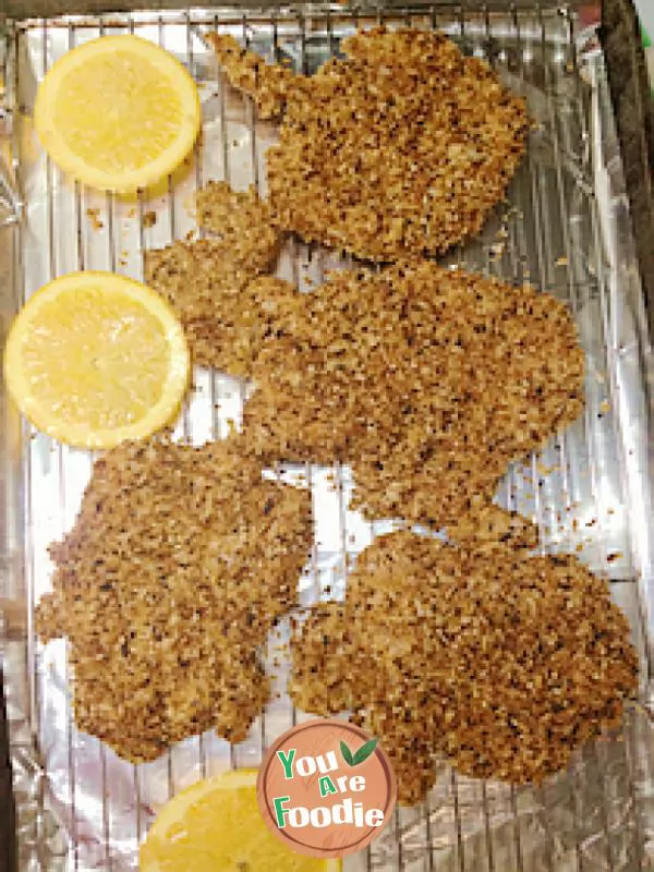 Roasted chicken chops with orange and sesame seeds