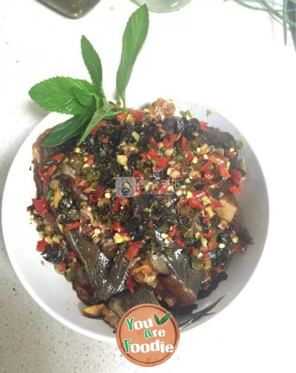 Steamed fish with purple perilla and chopped pepper in soy sauce