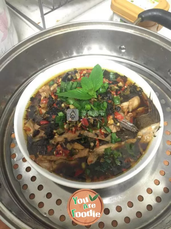 Steamed fish with purple perilla and chopped pepper in soy sauce