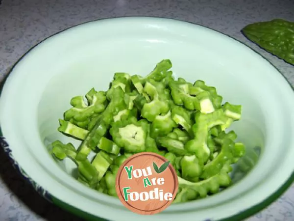 Quick fried bitter gourd and pepper in soy sauce