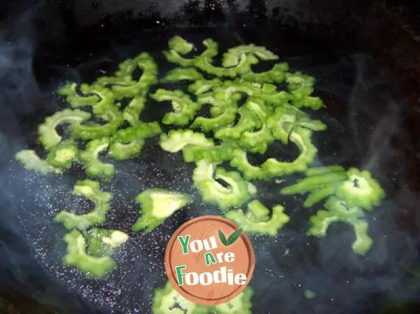 Quick fried bitter gourd and pepper in soy sauce