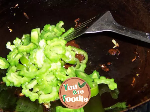 Quick fried bitter gourd and pepper in soy sauce