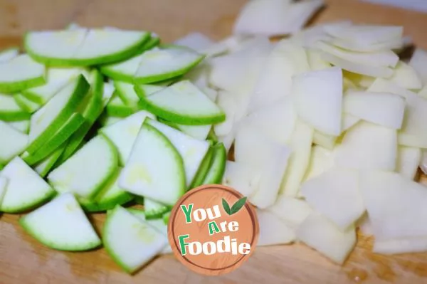 Fried zucchini with potatoes