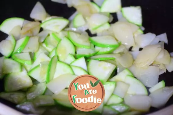 Fried zucchini with potatoes