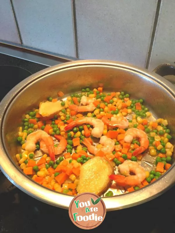 Baked rice with fresh shrimp, seasonal vegetables and cheese