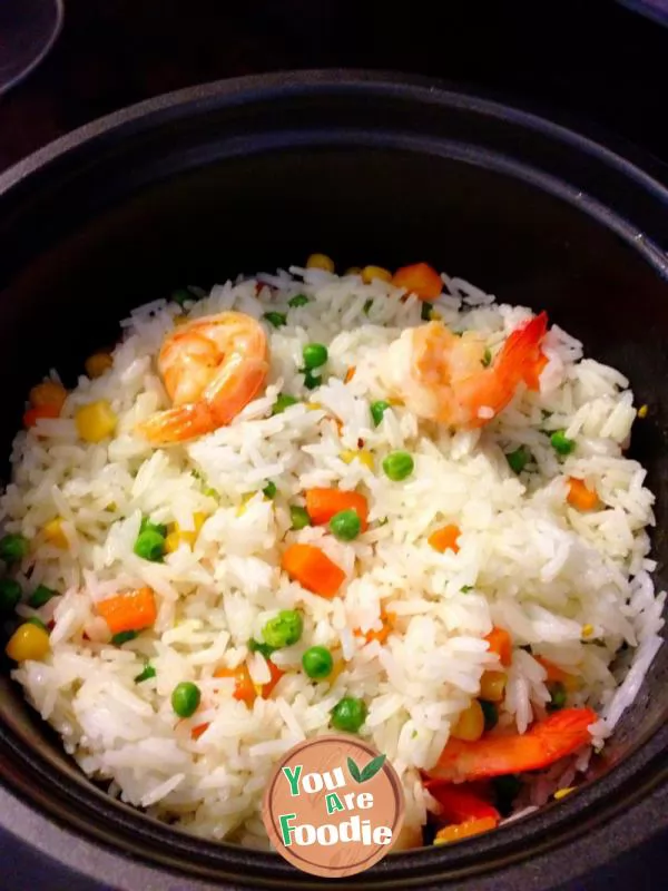 Baked rice with fresh shrimp, seasonal vegetables and cheese