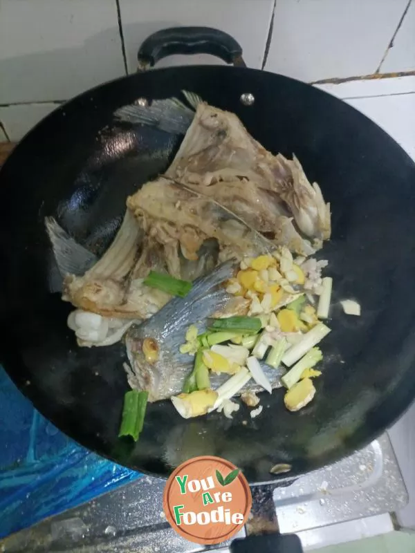 Stewed Tofu with Fish Head