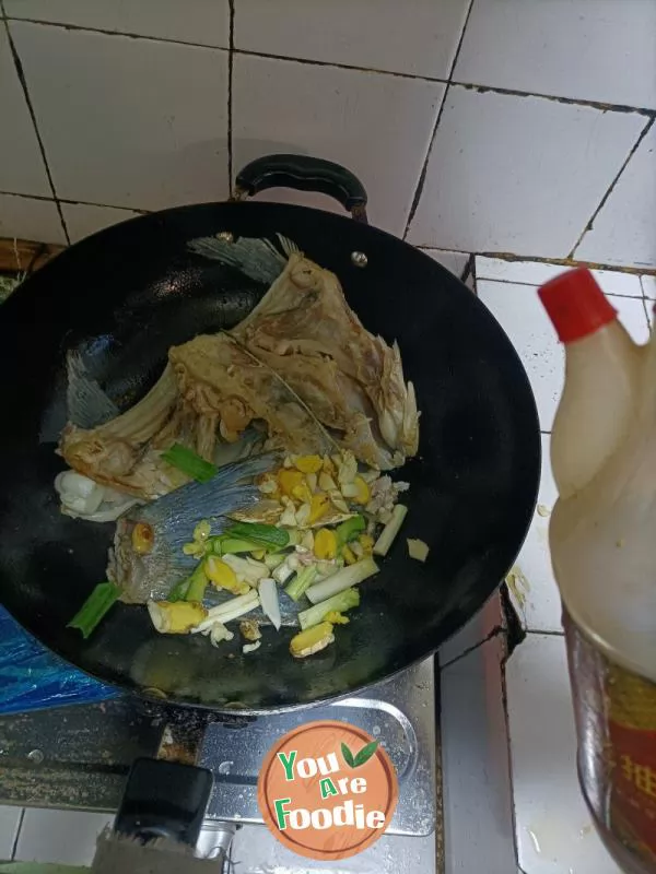 Stewed Tofu with Fish Head