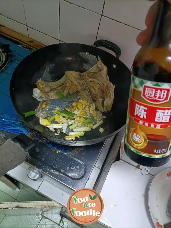 Stewed Tofu with Fish Head