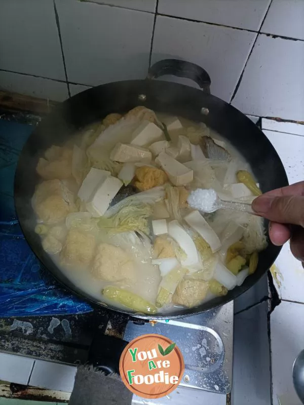 Stewed Tofu with Fish Head