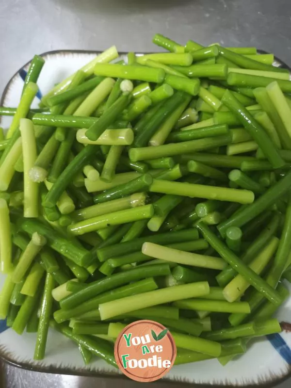 Fried meat with garlic sprouts