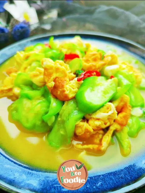 Fried egg with towel gourd