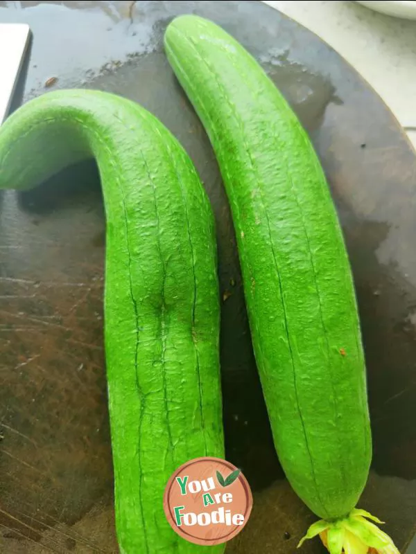 Fried egg with towel gourd