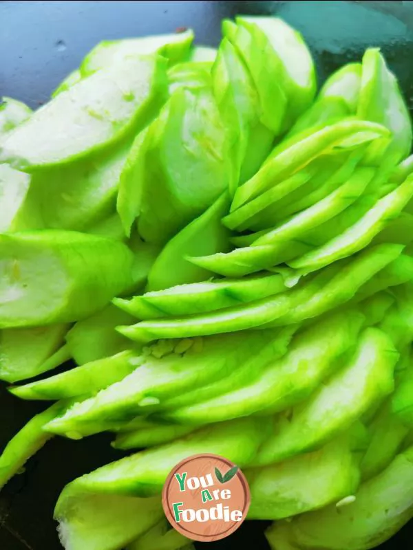 Fried egg with towel gourd