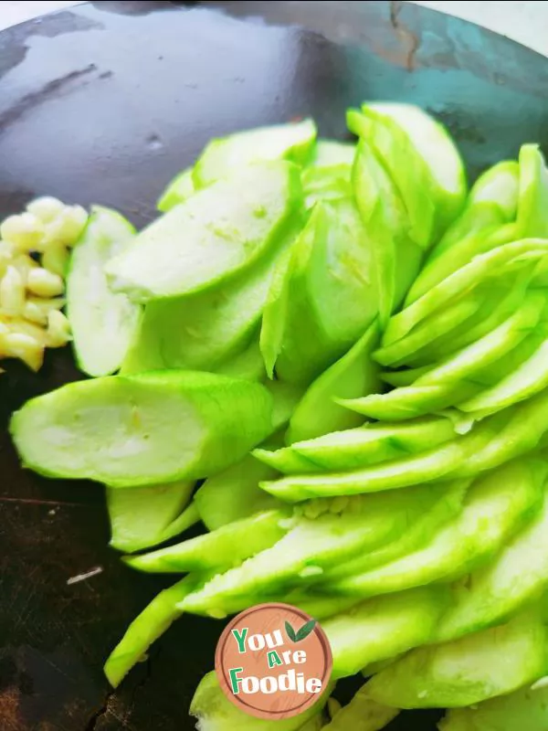 Fried egg with towel gourd