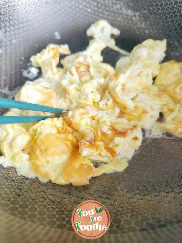 Fried egg with towel gourd