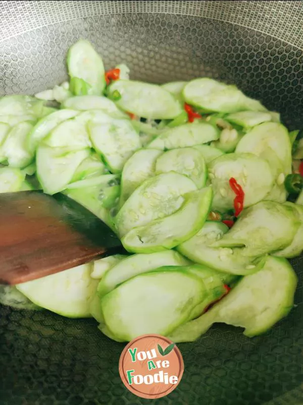 Fried egg with towel gourd