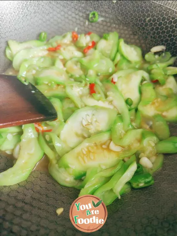 Fried egg with towel gourd