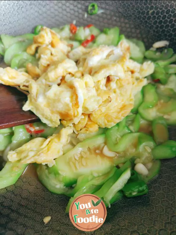 Fried egg with towel gourd