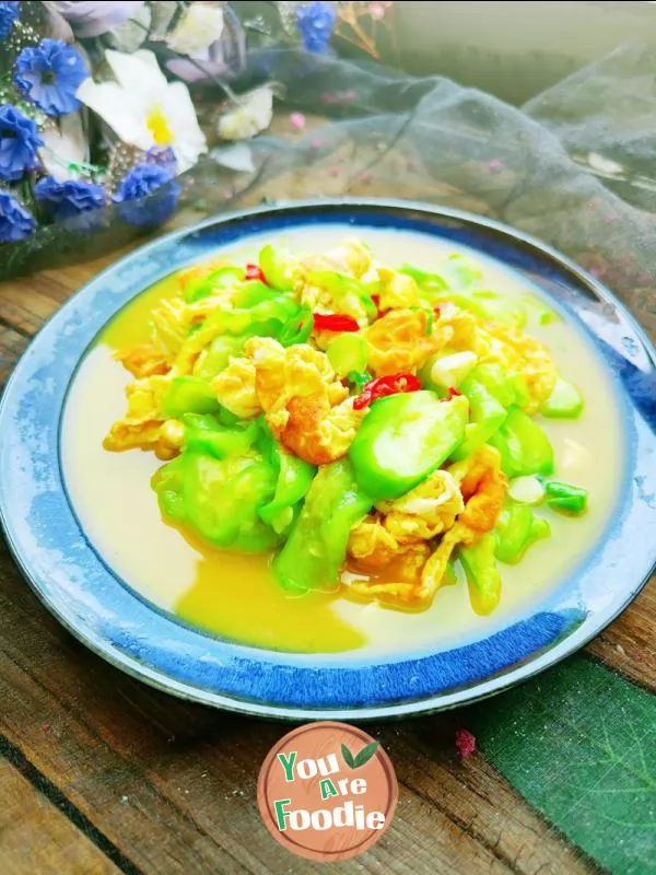 Fried egg with towel gourd