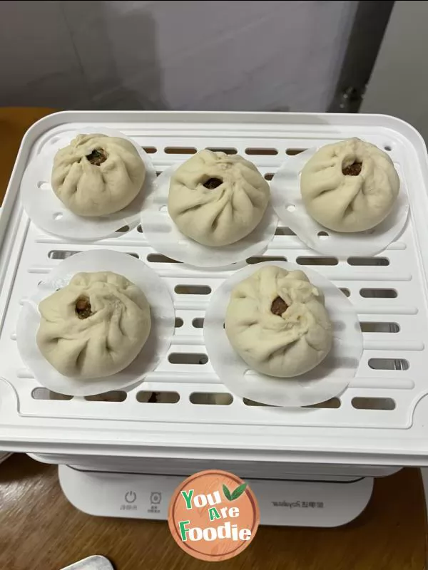 Steamed pork bun in soup