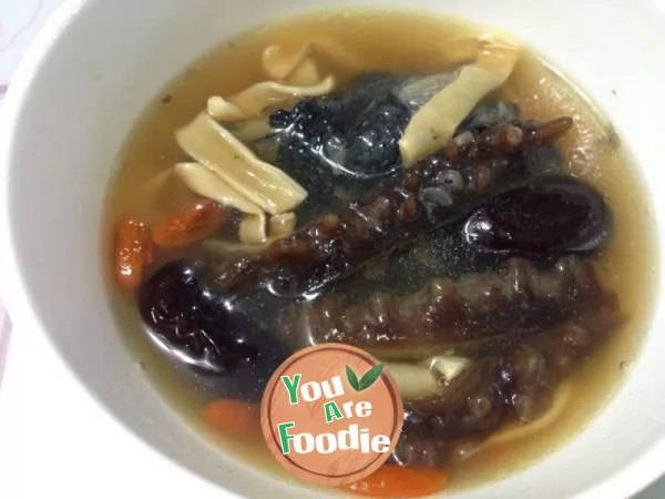 Sea cucumber, fish glue and black chicken soup