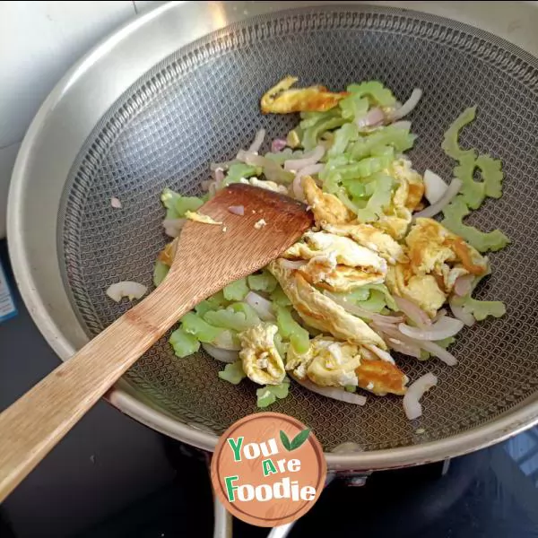 Fried egg with onion and bitter gourd