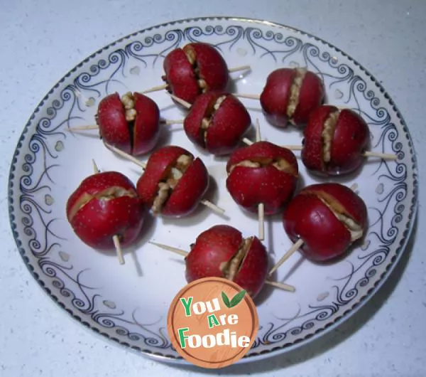 candied gourd on a stick