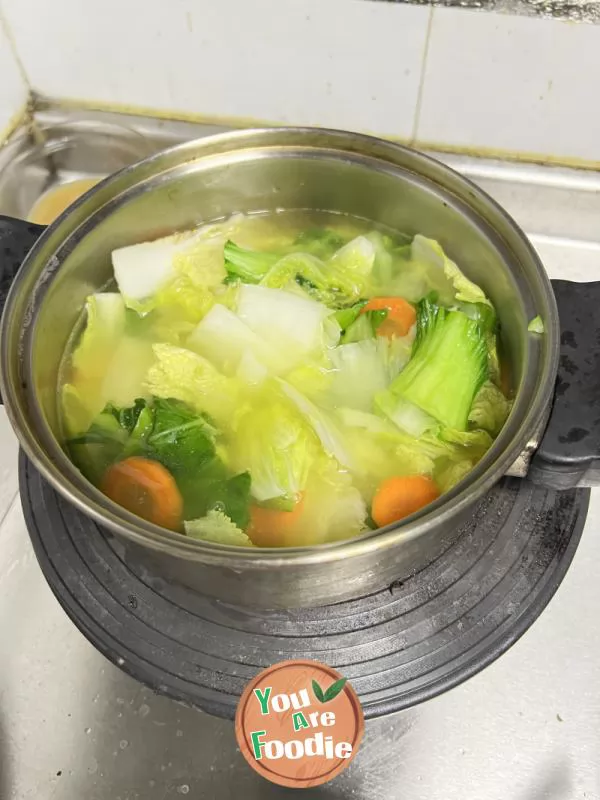 Healthy vegetable and fried dough sticks soup