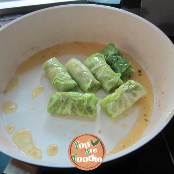 Pan fried green cabbage rolls