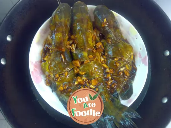 Steamed with sauce: Yellow bone fish in golden sauce