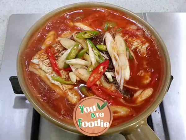 Black silver carp fish tail spicy fish soup