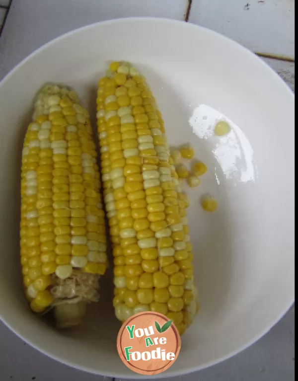 Fried meat with fruit and corn