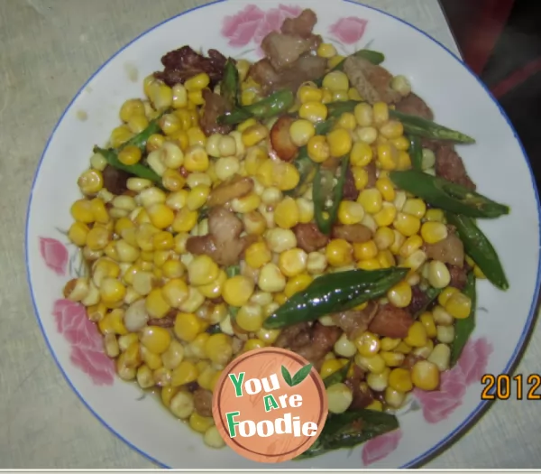 Fried meat with fruit and corn