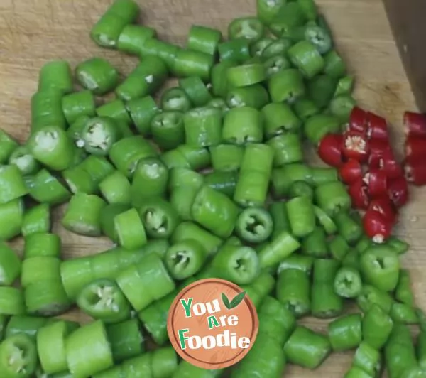 Fried preserved egg with pepper