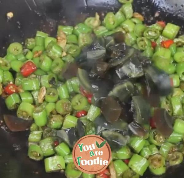 Fried preserved egg with pepper