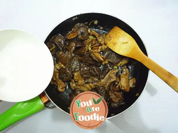 Fried sliced meat with mushroom