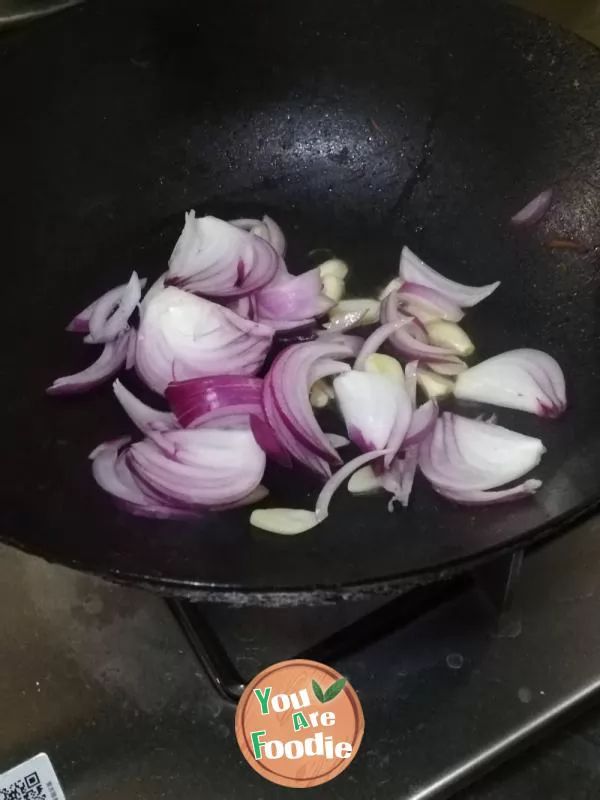 Fried green beans with onions