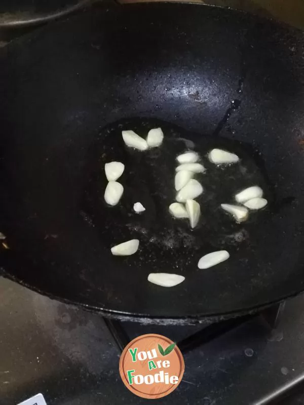 Fried green beans with onions